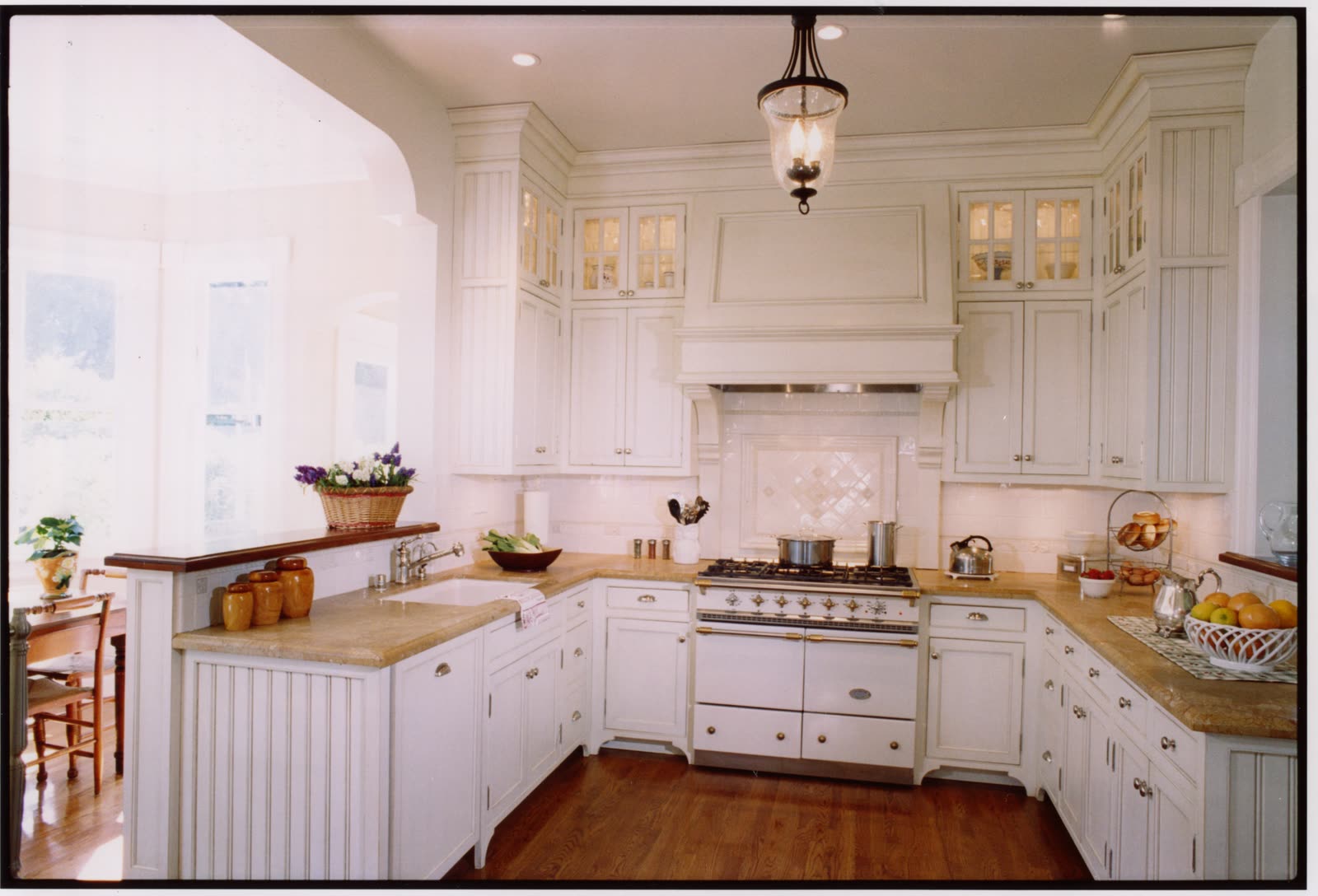 New kitchen with custom wood cabinets built by K.D. Clark Construction.